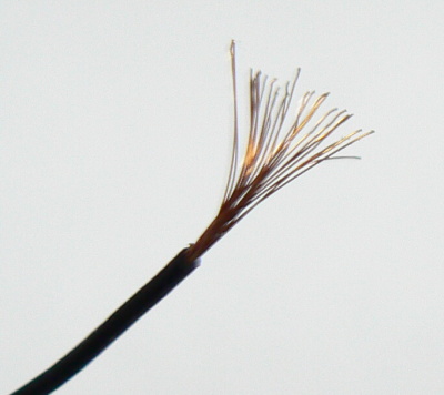 Vodič izolovaný měděný lanko 0,08 mm² červený
